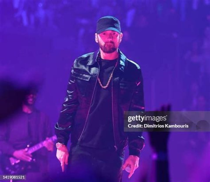 Eminem performs onstage at the 2014 MTV Movie Awards at Nokia Theatre L.A. Live